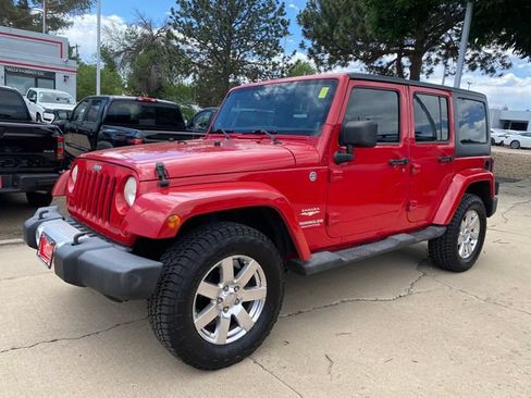 Used 2012 Jeep Wrangler Unlimited Sahara w/ Connectivity Group AWD/4WD image 1