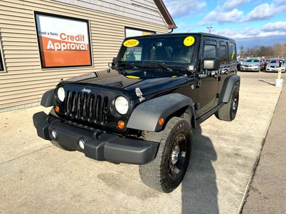 Used 2013 Jeep Wrangler Unlimited Sport w/ Dual Top Group