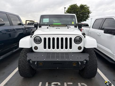 Used 2014 Jeep Wrangler Unlimited Sahara w/ Mopar Chrome Edition Group AWD/4WD image 2