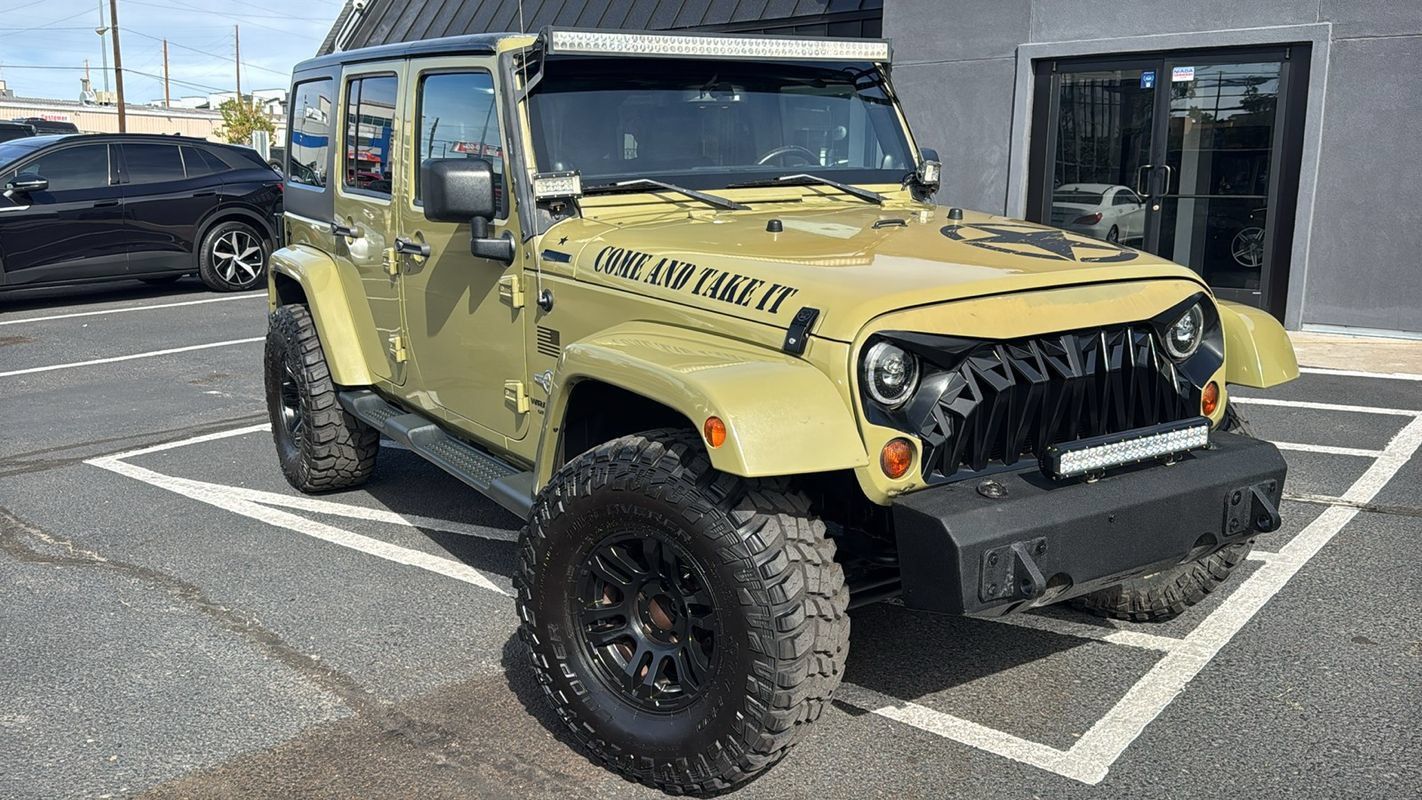 Used 2013 Jeep Wrangler Unlimited Sport AWD/4WD image 1