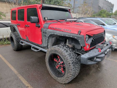 Used 2014 Jeep Wrangler Unlimited Rubicon AWD/4WD image 1