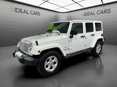 Used 2013 Jeep Wrangler Unlimited Sahara w/ Connectivity Group AWD/4WD image 1
