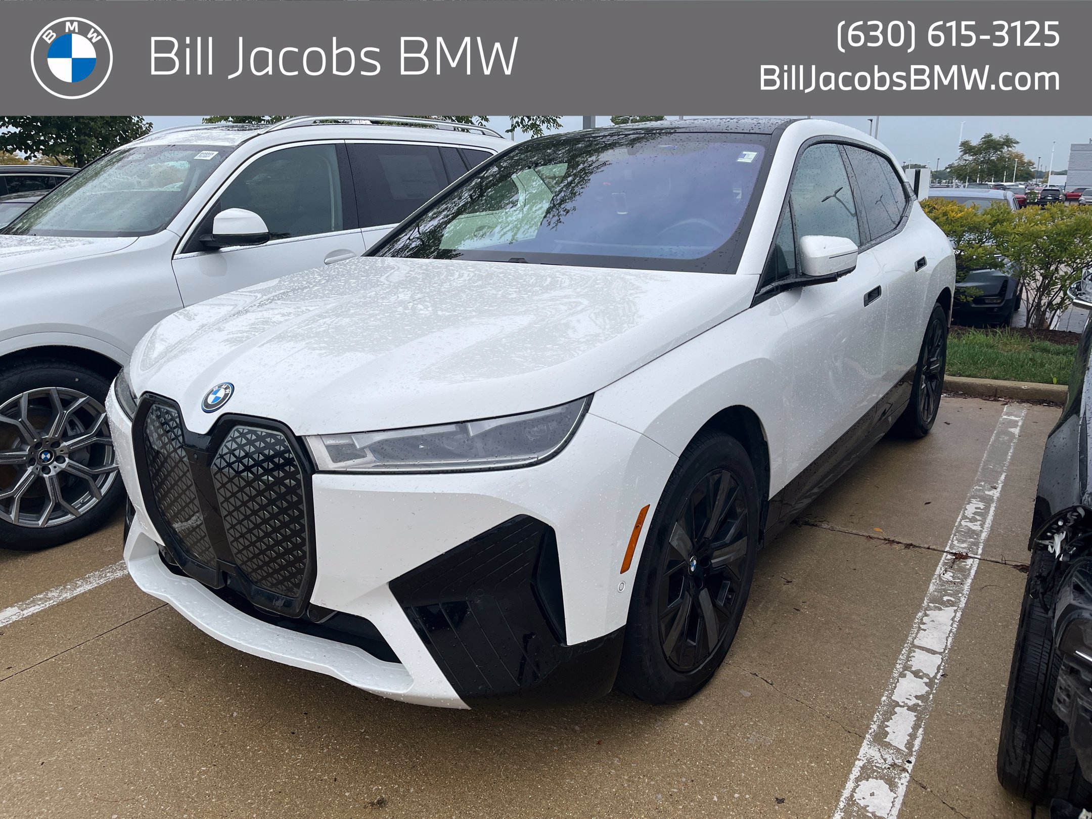 Used 2024 BMW iX xDrive50 w/ Premium Package AWD/4WD image 1