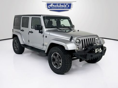Used 2013 Jeep Wrangler Unlimited Sahara w/ Connectivity Group AWD/4WD image 1