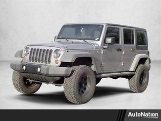 Used 2013 Jeep Wrangler Unlimited Sport w/ Mopar Black Appearance Group AWD/4WD video 1