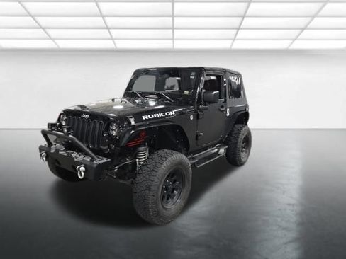 Used 2013 Jeep Wrangler Rubicon w/ Dual Top Group AWD/4WD image 9