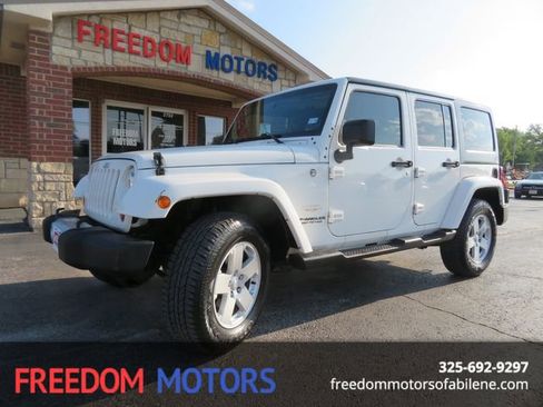 Used 2010 Jeep Wrangler Unlimited Sahara w/ Dual Top Group image 1