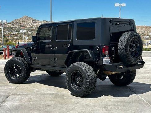 Used 2009 Jeep Wrangler Unlimited Rubicon w/ Dual Top Group AWD/4WD image 10