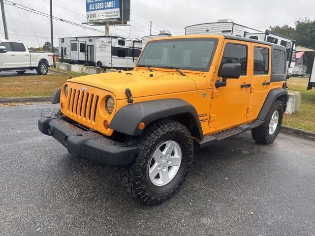 Used 2012 Jeep Wrangler Unlimited Sport AWD/4WD image 1
