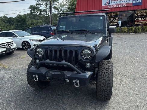 Used 2016 Jeep Wrangler Unlimited Sahara image 1