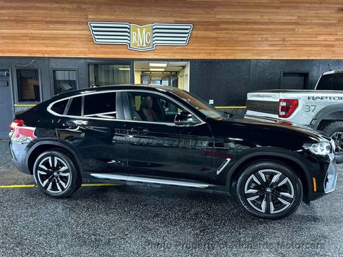 Used 2023 BMW X4 xDrive30i AWD/4WD image 1