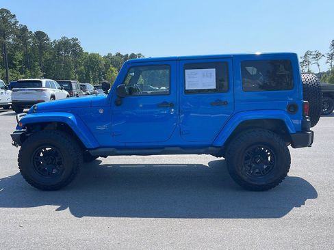 Used 2011 Jeep Wrangler Unlimited Sahara w/ Dual Top Group AWD/4WD image 4