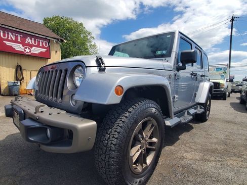 Used 2016 Jeep Wrangler Unlimited Sahara AWD/4WD image 1