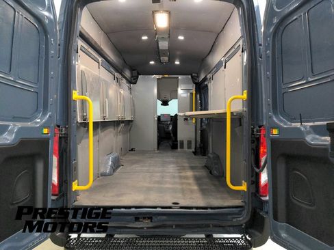 Used 2022 Ford Transit 250 148 High Roof Extended AWD w/ Parcel Delivery Package image 26