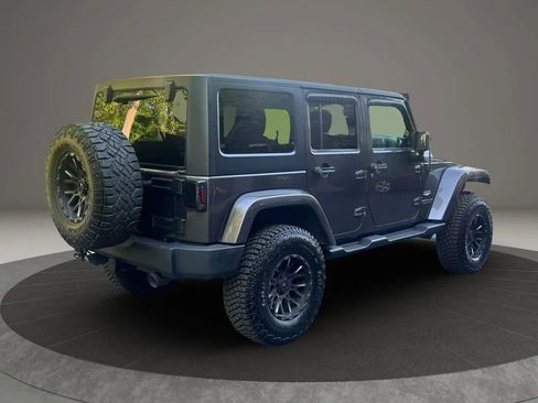 Used 2014 Jeep Wrangler Unlimited Sahara w/ Dual Top Group AWD/4WD image 5