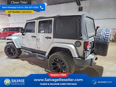 Used 2012 Jeep Wrangler Unlimited Sahara w/ Dual Top Group AWD/4WD image 3