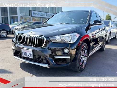 Used 2018 BMW X1 xDrive28i AWD/4WD image 1