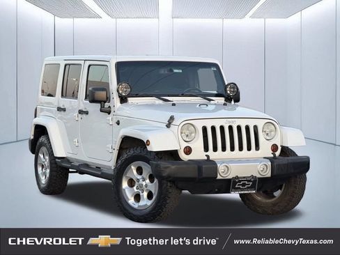 Used 2013 Jeep Wrangler Unlimited Sahara AWD/4WD image 1