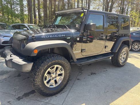 Used 2014 Jeep Wrangler Unlimited Rubicon w/ Dual Top Group image 2