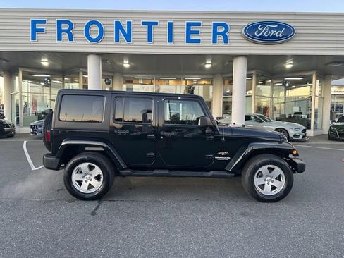 Used 2011 Jeep Wrangler Unlimited Sahara w/ Dual Top Group image 1
