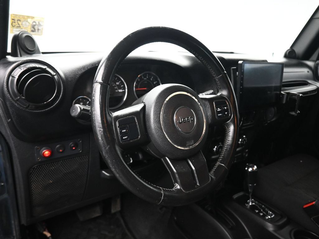 Used 2012 Jeep Wrangler Unlimited Sahara AWD/4WD image 11
