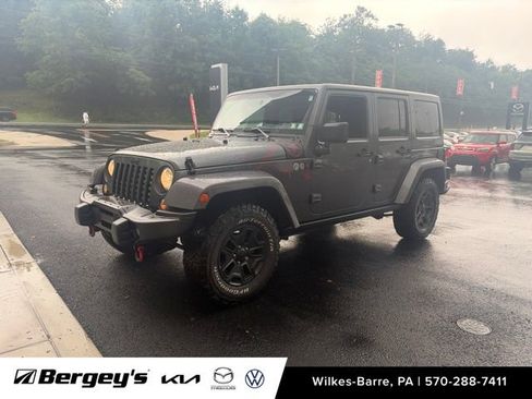 Used 2016 Jeep Wrangler Unlimited Sahara AWD/4WD image 1