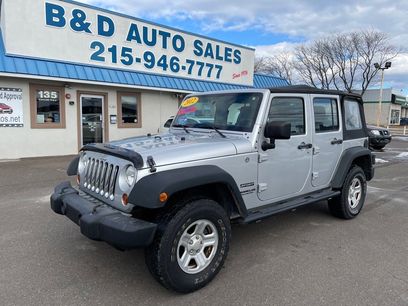 Used 2012 Jeep Wrangler Unlimited Sport w/ Black Appearance Group