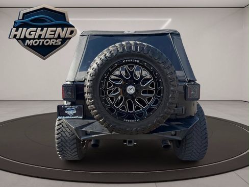 Used 2014 Jeep Wrangler Unlimited Rubicon w/ Dual Top Group AWD/4WD image 5