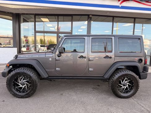 Used 2014 Jeep Wrangler Unlimited Rubicon w/ Connectivity Group AWD/4WD image 2