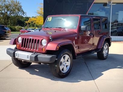 Used 2010 Jeep Wrangler Unlimited Sahara w/ Dual Top Group