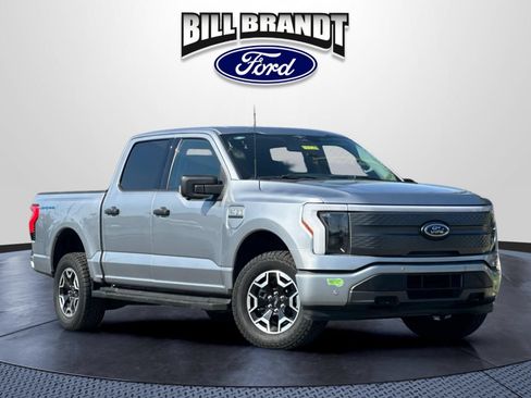 Used 2023 Ford F150 Lightning XLT AWD/4WD image 1