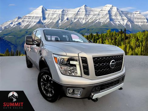 Used 2018 Nissan Titan PRO-4X w/ Pro-4x Utility Package AWD/4WD image 1