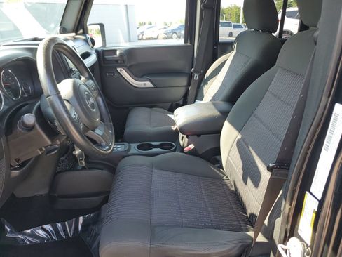 Used 2012 Jeep Wrangler Unlimited Sahara w/ Dual Top Group AWD/4WD image 15