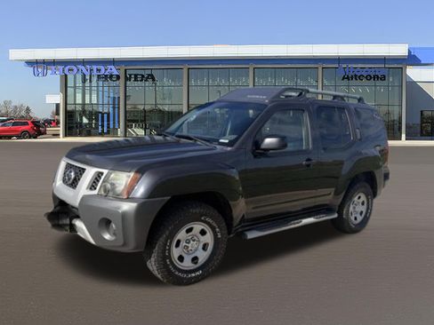 Used 2013 Nissan Xterra X AWD/4WD image 1