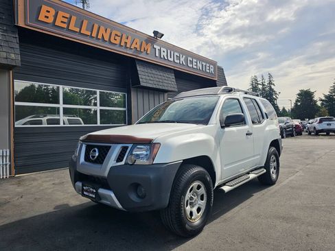 Used 2015 Nissan Xterra X AWD/4WD image 1