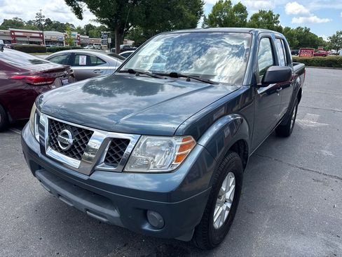 Used 2014 Nissan Frontier SV RWD image 1