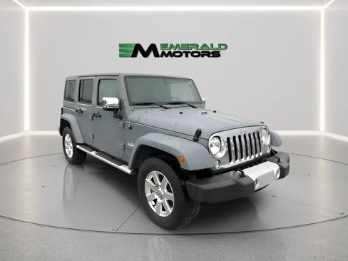 Used 2014 Jeep Wrangler Unlimited Sahara w/ Mopar Chrome Edition Group image 1