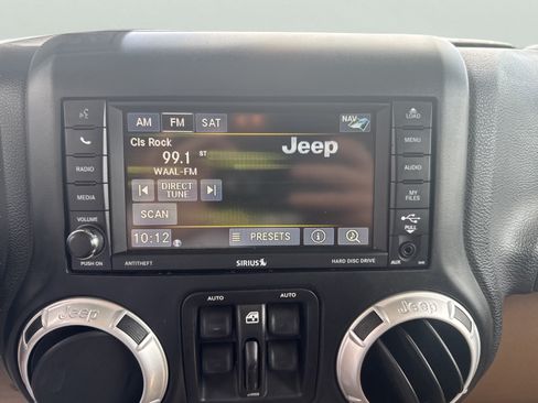Used 2015 Jeep Wrangler Unlimited Sahara w/ Dual Top Group AWD/4WD image 16