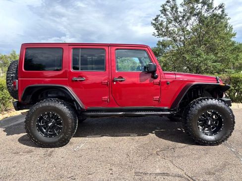 Used 2013 Jeep Wrangler Unlimited Sahara w/ Dual Top Group AWD/4WD image 10