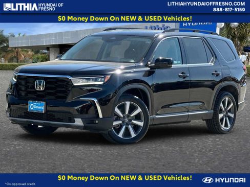 Used 2024 Honda Pilot Touring image 1