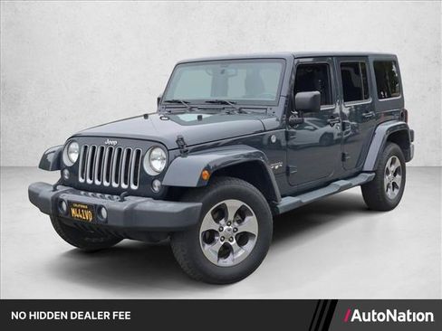 Used 2016 Jeep Wrangler Unlimited Sahara AWD/4WD image 1
