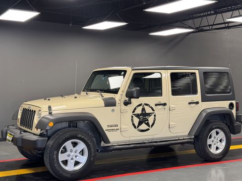 Used 2011 Jeep Wrangler Unlimited Sport image 1