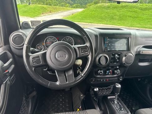 Used 2012 Jeep Wrangler Unlimited Sport AWD/4WD image 13