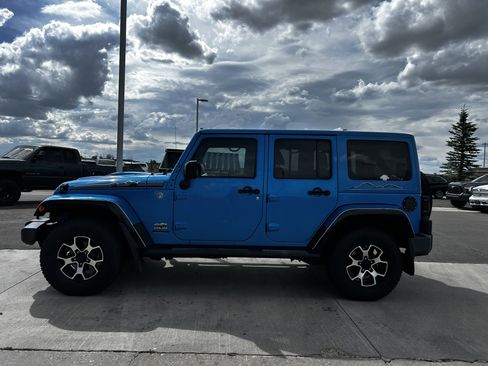 Used 2014 Jeep Wrangler Unlimited Sahara AWD/4WD image 2