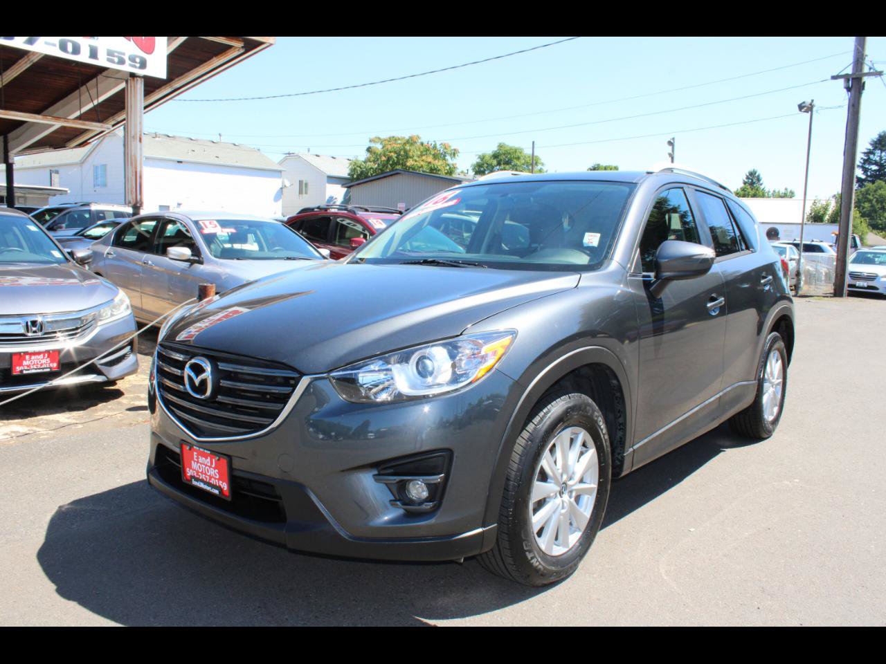 Used 2016 MAZDA CX-5 Touring w/ Bose/Moonroof Package FWD image 1