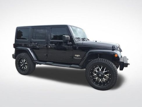 Used 2015 Jeep Wrangler Unlimited Sahara w/ Max Tow Package AWD/4WD image 1