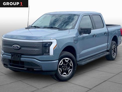 Used 2023 Ford F150 Lightning XLT AWD/4WD image 1