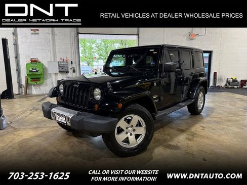 Used 2011 Jeep Wrangler Unlimited Sahara w/ Connectivity Group AWD/4WD image 1