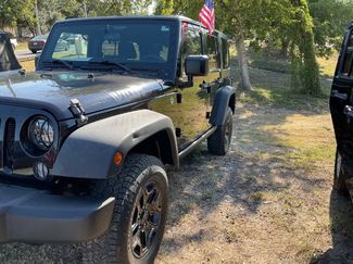 Used 2015 Jeep Wrangler Unlimited Sport image 1