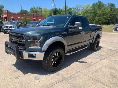 Used 2015 Ford F150 XLT AWD/4WD image 1